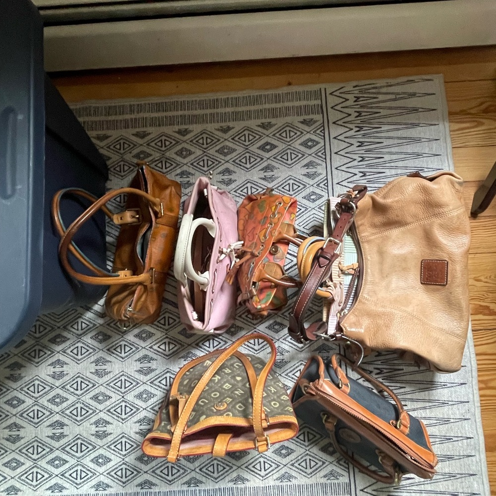 Lot of Dooney and Bourke Bags all different colors and styles vintage